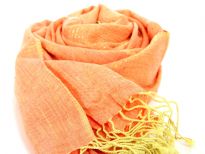 95% viscose with 5% metallic scarf in shades of orange and yellow. Thin metallic gold stripes run through it horizontally. Imported. Hand wash.