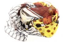 Beige colored sheer scarf has artistic print of semi circles, dots & stripes in brown, yellow, mustard colors. Brown colored border along its vertical length & criss-cross stripes along its width. 100% polyester scarf. Imported.