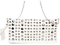Faux leather folding clutch studded with rhinestones. Top zipper closing. Back outside zipper pocket. Wrist strap and metal shoulder chain included.