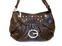 Ostrich embossed handbag made of polyurethane material has top zipper closure with diamond studs on the front. It is accentuated with belt buckle straps on each side of the purse and has a single strap.