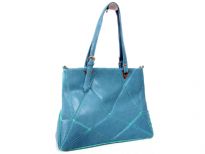 PVC Sewin Cut Out Double Handle Tote.Top zipper closing. Back zipper pocket.