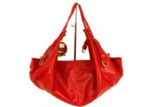 Designer Inspired Hobo Bag with a single strap and a zipper closure. Made of faux leather.