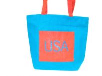 Jute tote bag has a USA label and double shoulder straps. 