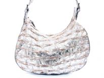 Metallic PVC shoulder bag. top zipper closing. Center divider.