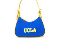 UCLA Nylon Collegiate Licensed Hobo Bag is made from fabric. It has a zipper and double adjustable handles. 