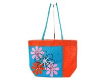 Hand embroided Jute shopping bag. Double handle and snap button closing.