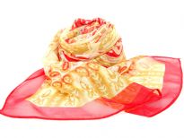 Beautiful Printed scarf in red with artistic pattern in gold comprising of paisleys, leaves & flowers. Lightweight & matches with any kind of outfit. 60% polyester and 40% silk.