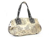 Designer Inspired Embroidered Shoulder Bag with zipper closure. Bag has a double handle with animal print pattern. Made of PU (polyurethane).