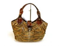 Designer Inspired Metallic Zebra Print Hobo Bag has push lock closure and a double handle. Made of PU (polyurethane)