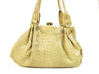 Croco Embossed PVC Fashion Handbag has a kiss lock closure and a double handle.