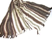 Off-white 100% viscose scarf with striped pattern in brown color. Little eyelash fringes along the length of scarf and threads like along the width of the scarf. Imported.