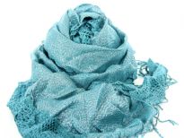 Crinkled & ruffled teal colored scarf with shiny silver patch running vertically in the middle and also mesh pattern bordering it. Fringes on the ends completes this stylish scarf. Imported.