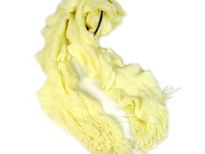 Ruffled ivory colored knitted scarf in acrylic material which is soft as well as lightweight. Fringes on the edges completes this scarf. Imported.