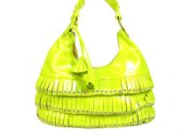 PVC fashion Hobo Handbag has studded details has a metallic texture, a top zipper closure, and a single strap. Made of faux leather.