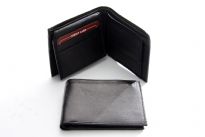 This leather wallet features 6 credit card slots, 1 ID window, a coin pocket. Double bill bifold wallet.