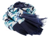 Rhombus print in shades of blue spans across this lightweight & soft to use polyester scarf which has navy border all around. Eyelash fringe along the longer side decorates this scarf. 100% Polyester. Hand wash. Imported.