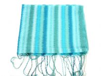 Multi Colored Stripes in shades of turquoise & green colors spread over this lightweight & long scarf. Stitches like embroidery all along the stripes decorates this little shiny 100% polyester scarf. Long twisted fringes on its ends. Imported. Hand wash.