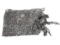 This leopard print 100% polyester scarf can add style to any kind of outfit during day or night. Asymmetrical ends with leaves like cut-out pattern. Very big in size so can be used in multiple ways as a cover-up, shawl or simply as a scarf. Imported.