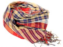 Navy colored plaids print covers this shiny gold colored 100% polyester scarf. Red border along the vertical edge of scarf & thin twisted fringes at the edges. Imported. Hand wash.