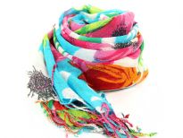 A garden of fresh flowers blooms on the fine wool weave of this vibrantly colored scarf finished with twisted long fringe at the edges. Imported. Dry clean only.
