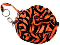 Faux leather zebra print clutch bag has zipper closure and a detachable metal shoulder chain. 