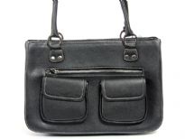 Front Double Pocket Fashion handbag has a top zipper closure and a double handle. Made of faux leather.