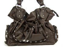 Fashion Handbag has a drawstring closure, a double handle and outside pockets. Made of PVC.