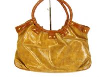 Designer Inspired Mesh pattern Hobo Handbag has a snap closure and a ring double handle. Made of PU (polyurethane).