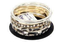 This tribal print six pieces bangles set has three print bangles, one silver colored mesh bangle & one black thread covered bangle. Lightweight design & matches with number of outfits. Imported.