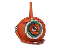 Round clutch bag has an accentuating floral detail, a top zipper closure and a detachable single strap. Made of fuax leather.