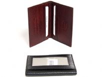 Carry your money in style. This is a genuine leather RFID Blocking credit card wallet. Features 6 credit card slots and one exterior ID window. Slim design for front or back pockets. As this is genuine leather, please be aware that there will be some small creases and nicks in the leather but the wallet are all brand new. 