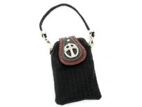 Cell phone pouch has a studded cross detail. Can be attached to any handbag Made of Faux Leather