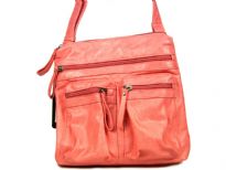 Fashion bag has multiple exterior pockets with zipper closure. Single strap. Made of PVC. 