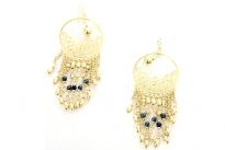 Black beads on Golden earrings.