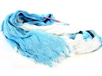 Crinkled Two Tone Woven Polyester Scarf with eyelash fringes all around it. Soft and lightweight to use & comes on a small round hanger. Imported. 100% polyester.