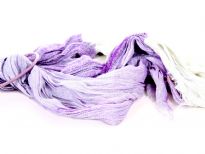 Crinkled Two Tone Woven Polyester Scarf with eyelash fringes all around it. Soft and lightweight to use & comes on a small round hanger. Imported. 100% polyester.