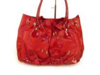 Designer Inspired Handbag with drawstring closure & double handle has flowered applique details and ruched at bottom. Made of PU (polyurethane).