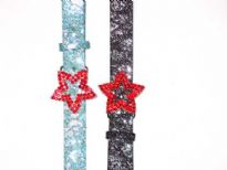 Ladies Belts/Sold Per dozen. Belt has a shinny texture and a star buckle.