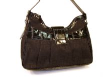 Overlap square print jacquard fashion handbag with patent leather patchwork, shoulder strap & top zipper closure. Imported.