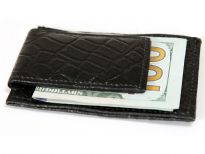 Carry your money in style. This is a Genuine Leather magnetic Money clip, credit card holder. As this is genuine leather, please be aware that there will be some small creases and nicks in the leather but the wallet are all brand new. 