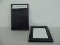 Glass Mirror set in Genuine Leather