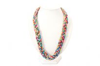 Multi colored threads & metal chain are braided together to make this beautiful & colorful 2 cm wide necklace. Imported.