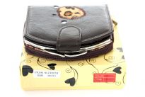 Genuine Leather Ladies wallet. The wallet comes with Gift Box.