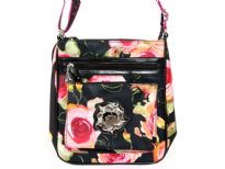 Betty Boop Printed PVC Messenger Bag made with fabric. Has zipper closure with a single adjustable strap. 