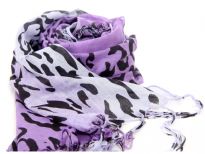 Cow print in black over 100% viscose scarf in shades of purple & lilac. Threads like long fringes on the ends of the scarf. Imported.
