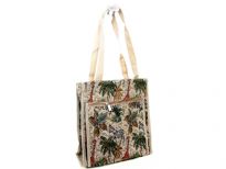 Printed Jacquard shopping bag. Top zipper closing and front zipper pocket.