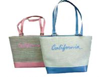 Fashionable California bag has a double shoulder straps and a top zipper closure. Made of fabric.