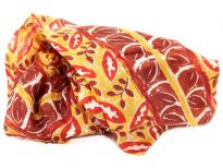 Leafy print in red & brown on this yellow colored 100% silk scarf. Bright colored scarf can enliven any kind of outfit & can be used in any possible way. Made in India.