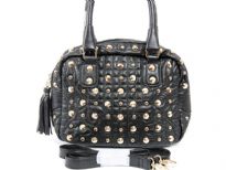 Faux Leather Metal Eyelets studded double handle bag. Top zipper closing. Inside size zipper pocket, adjustable shoulder strap included.