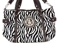 Animal Print Fleur De Liz Handbag with double shoulder handle as well as removable long shoulder strap.  Top zipper closing.